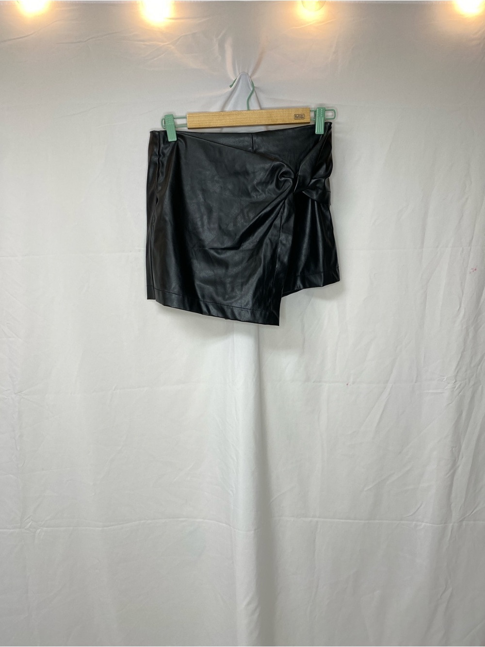 Blāshe Black Faux Leather Knot Mini Skirt size S